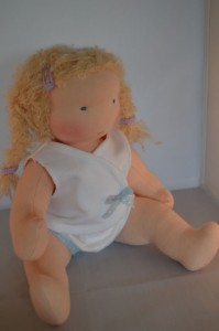 jointed doll sitting